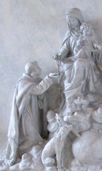 Dominic receives rosary statue