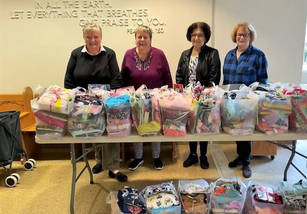 Associates collect pjs Lto R: Associates Ellen O'Sullivan, Diane Dunne, Ann Hagopian, and Rae-Ann Heim